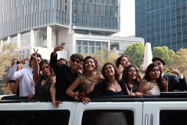 Happy customers enjoying luxury limousine service from freightmove.pro during a memorable event.