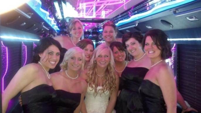 Happy customers enjoying luxury limousine service from freightmove.pro in a memorable experience.