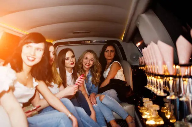 Luxury limousine service by freightmove.pro showcasing satisfied customers enjoying memorable experiences.