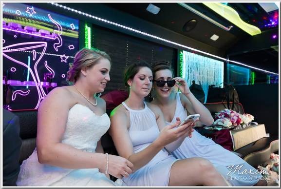 Happy customers enjoying luxury limousine service from freightmove.pro during a memorable event.
